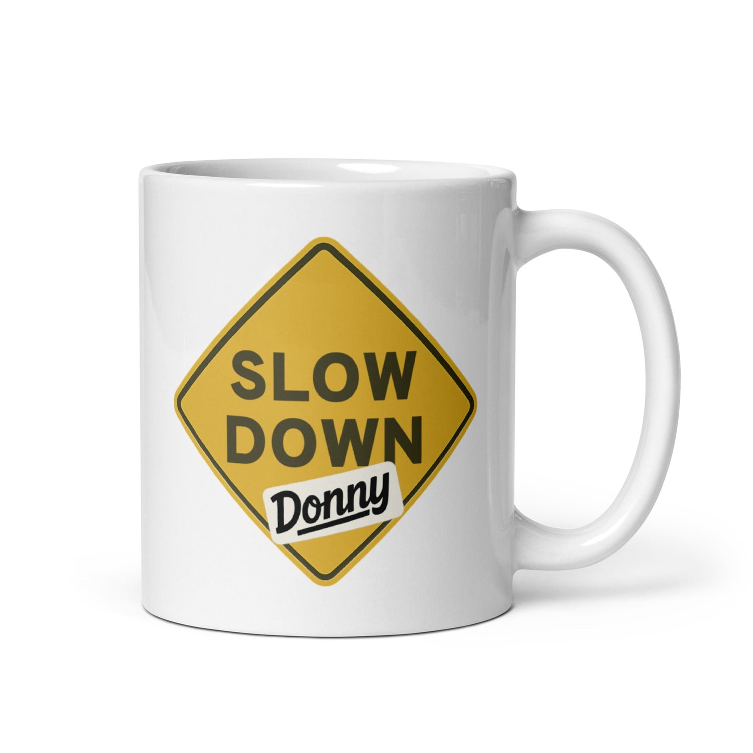 White ceramic mug with a 'Slow Down, Donny | We Have Our Limit Too' graphic by State Limit Apparel