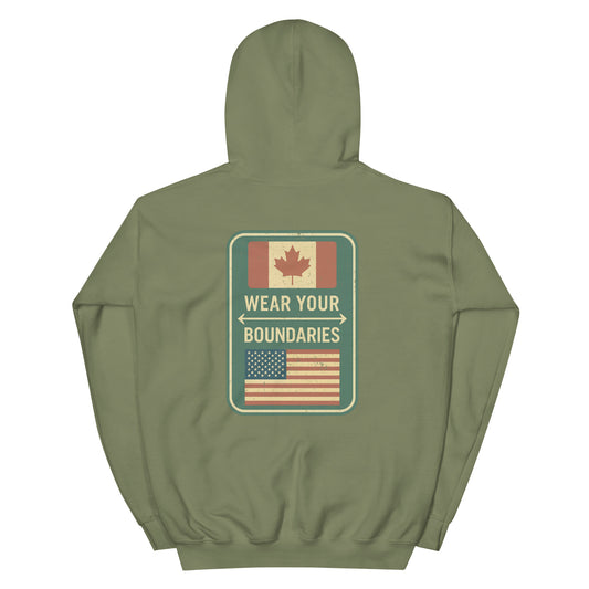 Military Green hoodie with a 'Canadian Shield | Boundaries' road sign bold graphic on back by State Limit Apparel.