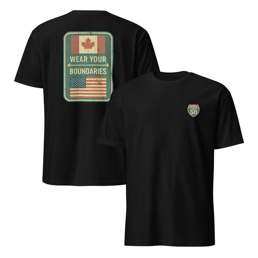 Black graphic t-shirt with a 'Canadian Shield | Boundaries' road sign design by State Limit Apparel.