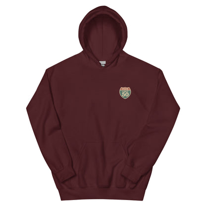 Maroon graphic hoodie with a 'Canadian Shield | On Guard for Thee' road sign design by State Limit Apparel.
