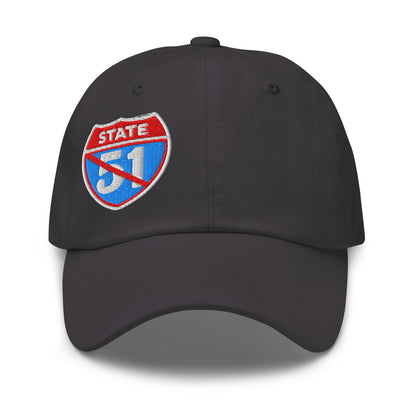 Dark grey classic dad hat embroidered with a 'Road Closed | Not the 51st State' graphic by State Limit Apparel.