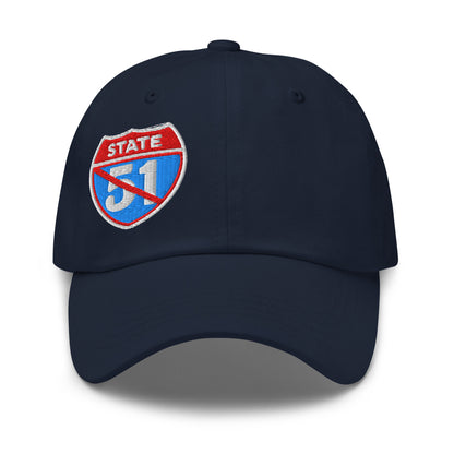 Navy blue classic dad hat embroidered with a 'Road Closed | Not the 51st State' graphic by State Limit Apparel.