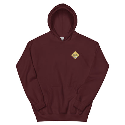 Maroon graphic hoodie with a 'Slow Down, Donny | We Have Our Limit Too' road sign inspired design by State Limit Apparel.