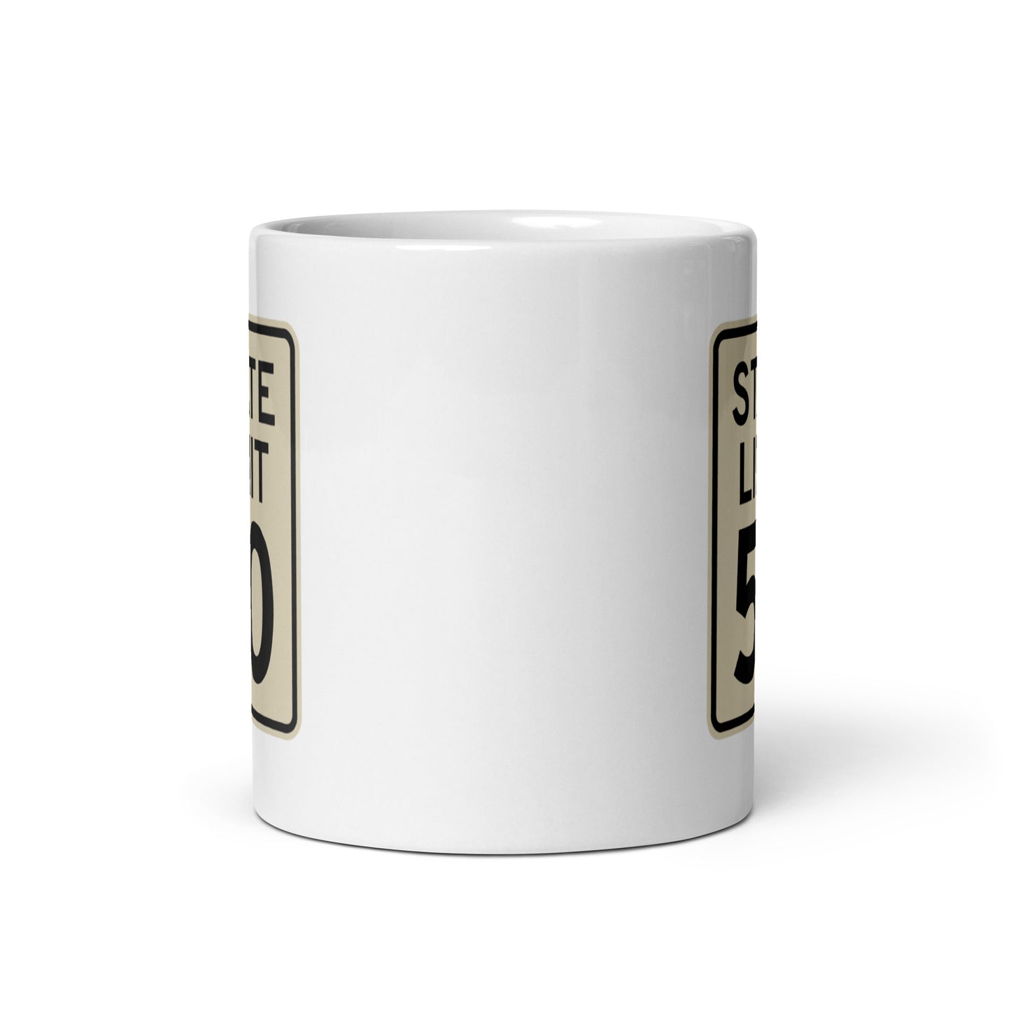 View of white ceramic mug with road sign graphic by State Limit Apparel to both sides.