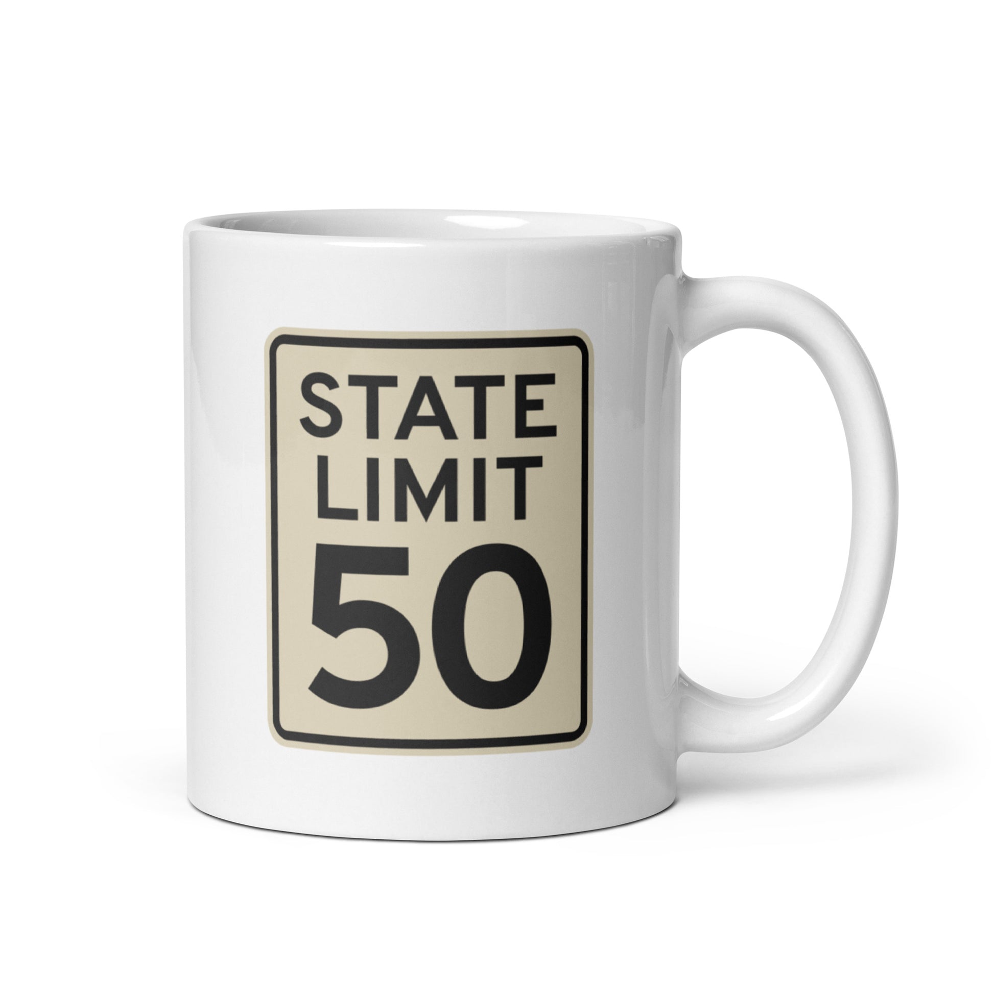 White ceramic mug with a 'State Limit | Keep Canada Canadian' road sign graphic by State Limit Apparel.