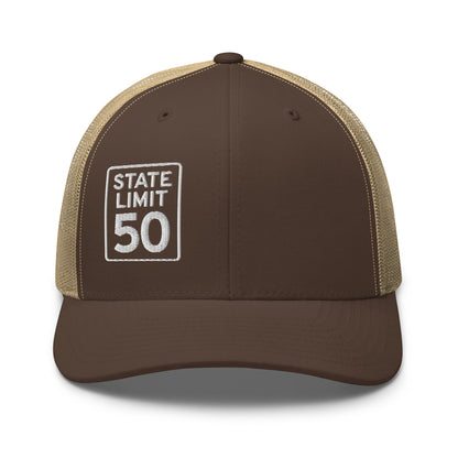 Brown-khaki retro trucker hat embroidered with a 'State Line | 50 is Just Fine' road sign graphic by State Limit Apparel.