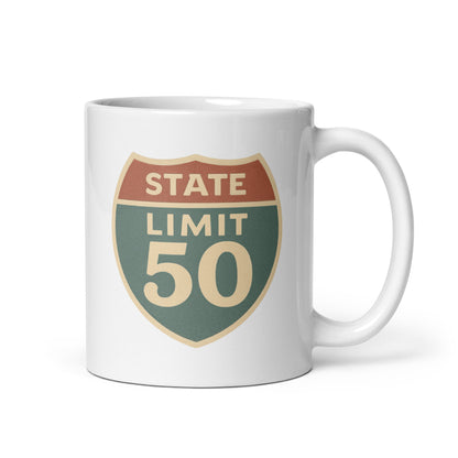 White ceramic mug with a retro 'Canadian Shield | On Guard for Thee' graphic by State Limit Apparel.
